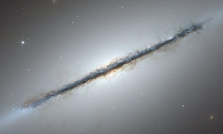 Observations of hydroxyl in early-type galaxies